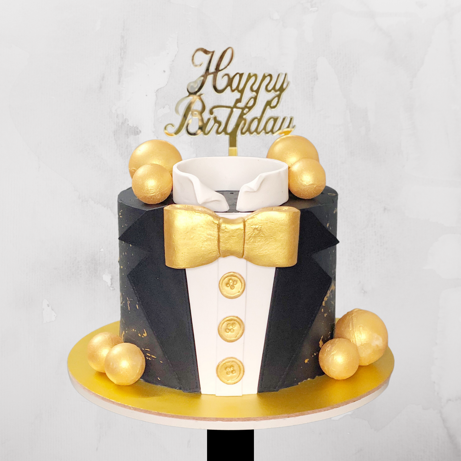 Tux & Gold Ball Cake
